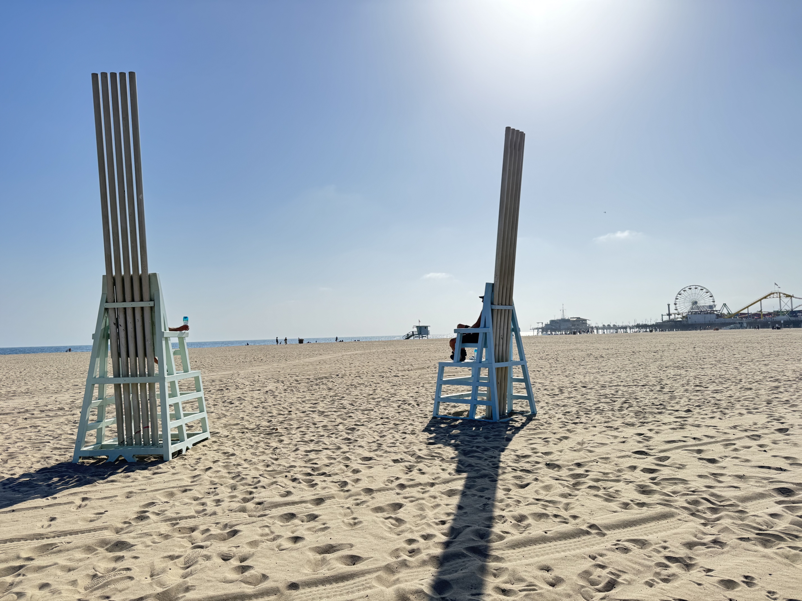 Two Large Chairs at Santa Monica Chairs. Depiction of the Teal Blue Singing Beach Chairs, Douglas Hollis, 1987