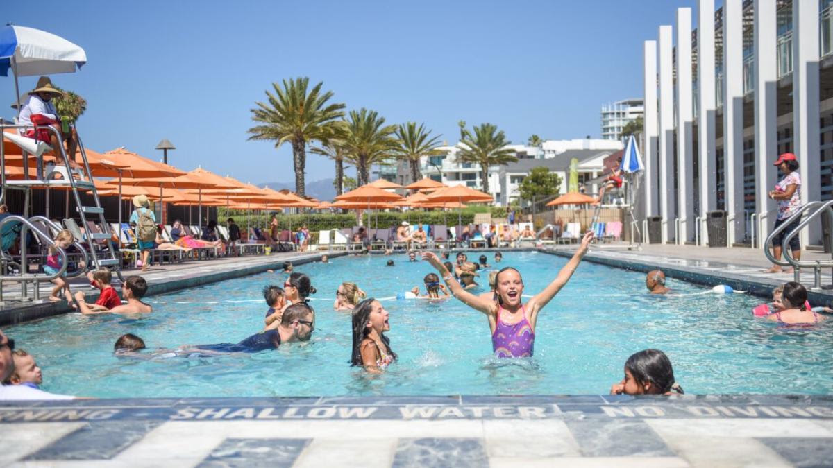 Photo of People at the pool at the Annenberg Beach House